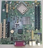 Motherboard de socket metálico Core Duo — Tarjetas de circuito. Motherboard cuyo socket es de METAL: marco y tapa metálica con el centro cuadrado, para procesador sin pines (época Core Duo / Core 2, no serie i). Retirar pila y disipadores.