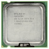 CPU P4 / fibra verde con metal — Procesadores y chips. CPU Intel Pentium 4 / AMD verde con pines y disipador metálico.